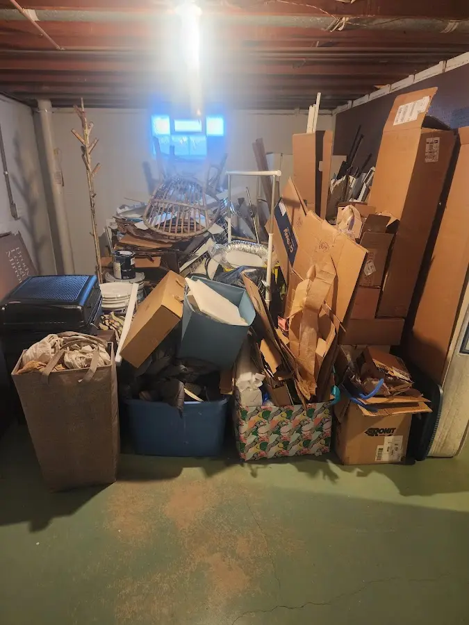 Roll-off dumpster container at job site for 15 Yard Dumpster Rental in West New York